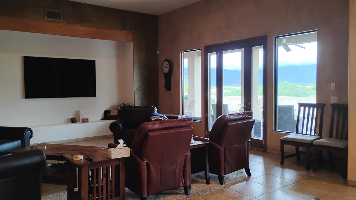 Tucson living room with patio doors, maintained on a recurring cleaning schedule
