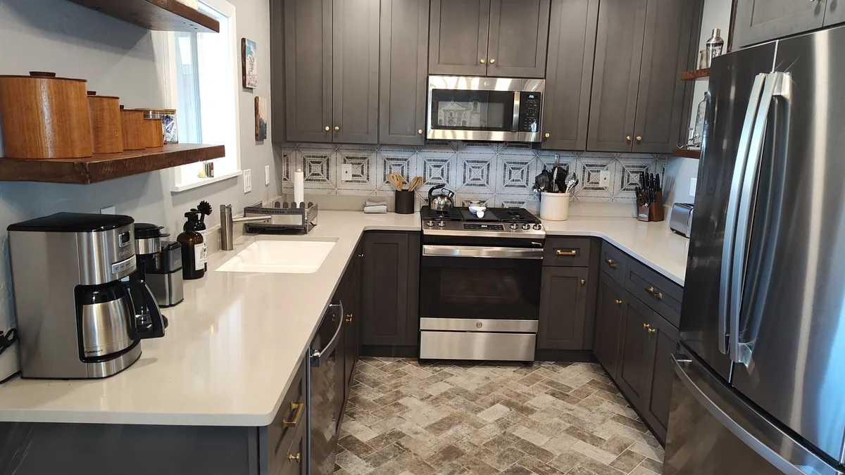Tucson kitchen with cleared counters, range and sink after a routine cleaning